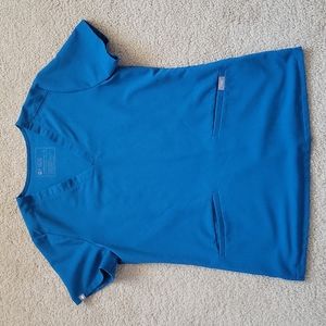 Figs XS alps blue top with three pockets.